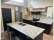 Spacious kitchen featuring an island with granite countertops, stainless appliances, and subway tile backsplash at , Indianapolis, IN 46227