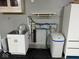 Utility room featuring utility sink and water filtration system at , Indianapolis, IN 46227