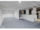Unfinished basement with painted walls, beams and concrete block, perfect for storage or renovation at 720 Blanchard St, Shelbyville, IN 46176