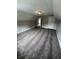 Bedroom featuring a large carpeted area, neutral walls, base trim and white doors at 733 Haugh St, Indianapolis, IN 46222
