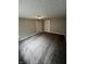 Bedroom featuring neutral walls, base trim, carpeted flooring and white doors at 733 Haugh St, Indianapolis, IN 46222