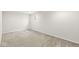 Basement featuring neutral walls, plush carpeting, and a small window at , Greenwood, IN 46143