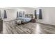 Spacious main bedroom with wood-look floors, sitting area, and ample natural light at , Greenwood, IN 46143