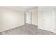 Neutral bedroom with gray carpeting, white walls, and white trim at , Greenwood, IN 46143