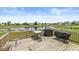 Relaxing deck with seating and barbecue, with a picturesque view of the community pond at , Greenwood, IN 46143