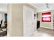Hallway shot showcasing interior doors and tile flooring at 7455 W 700 N, Fairland, IN 46126