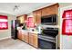 Well-equipped kitchen features modern appliances and granite countertops at 7455 W 700 N, Fairland, IN 46126
