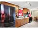 Spacious kitchen with stainless steel appliances and wooden cabinetry at 7455 W 700 N, Fairland, IN 46126