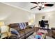 Bright and airy living room featuring hardwood floors and a relaxed workspace at 7455 W 700 N, Fairland, IN 46126