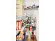 Organized pantry shelves filled with food and small appliances; mixer, cereals, snacks, and more at 7546 Kidwell Dr, Indianapolis, IN 46239