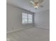 Bedroom showcases a ceiling fan and a bright window with views of outside at 824 Ashton Park Dr, Greenwood, IN 46143