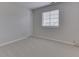 Bedroom features plush carpet, neutral paint, and a bright window at 824 Ashton Park Dr, Greenwood, IN 46143