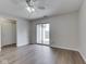 Spacious bedroom featuring hardwood floors, ceiling fan, closet and sliding glass doors to deck at 824 Ashton Park Dr, Greenwood, IN 46143