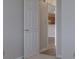 An open doorway provides a view into the kitchen area of the home at 824 Ashton Park Dr, Greenwood, IN 46143