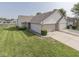 Well-maintained home featuring a two-car garage, manicured lawn, and charming curb appeal at 824 Ashton Park Dr, Greenwood, IN 46143