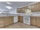 Functional kitchen offers bright countertops and ample cabinet storage space at 824 Ashton Park Dr, Greenwood, IN 46143