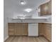 Efficient kitchen offers bright countertops and views into the living room at 824 Ashton Park Dr, Greenwood, IN 46143