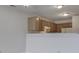 Charming kitchen featuring wooden cabinetry, ample counter space, and natural light at 824 Ashton Park Dr, Greenwood, IN 46143
