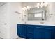 Bright bathroom with double sink vanity and granite countertop at 8635 Verbena Rd, Zionsville, IN 46077