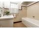 Bathroom with classic-style tiling and a combination shower and bathtub at 8717 Moore Rd, Indianapolis, IN 46278