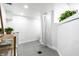 Clean bathroom featuring a shower with curtains, with bright white features at 8717 Moore Rd, Indianapolis, IN 46278