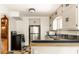 Cozy kitchen with stainless steel appliances, wood countertops, and ample cabinet storage at 8717 Moore Rd, Indianapolis, IN 46278