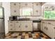 Well-lit kitchen with stainless steel appliances and classic cabinets at 8717 Moore Rd, Indianapolis, IN 46278