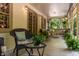 Charming covered porch featuring comfortable seating and natural light at 8717 Moore Rd, Indianapolis, IN 46278