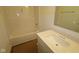 Bright bathroom featuring a bath tub and sink with a modern vanity and fixtures at 10132 Redwood Peak Ln, Indianapolis, IN 46259