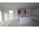 Spacious kitchen with white cabinets, a center island, and ample room for customization at 10132 Redwood Peak Ln, Indianapolis, IN 46259