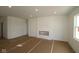 Spacious living room with neutral walls, recessed lighting, and a cozy fireplace nook ready for personalization at 10132 Redwood Peak Ln, Indianapolis, IN 46259