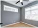 Corner bedroom with light hardwood floors and two windows that provide natural light at 1021 N Alabama St, Indianapolis, IN 46202