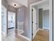 Upstairs hallway featuring views of the bathroom and bedrooms at 1021 N Alabama St, Indianapolis, IN 46202
