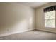 Bedroom with neutral walls and carpet and one window at 10248 Noble Ct, Indianapolis, IN 46234
