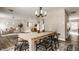 Contemporary dining space with a wood table, modern chairs, and stylish decor at 10248 Noble Ct, Indianapolis, IN 46234