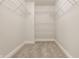 Walk-in closet with carpet and metal shelves at 10248 Noble Ct, Indianapolis, IN 46234