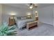 Comfortable bedroom with a large bed, ceiling fan, and side tables with lamps at 10510 Mcclain Dr, Brownsburg, IN 46112