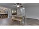 Bright dining area showcasing an open floor plan and views of the kitchen and living room at 10510 Mcclain Dr, Brownsburg, IN 46112