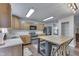 Well-equipped kitchen with an island for dining, updated cabinets, and modern appliances at 10510 Mcclain Dr, Brownsburg, IN 46112