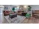 Cozy living room featuring plush sofas, area rug, and natural light, perfect for relaxing and entertaining guests at 10510 Mcclain Dr, Brownsburg, IN 46112