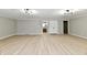 Finished basement featuring durable wood-look floors, recessed lighting, and plenty of space at 1053 Millwood Ct # 3, Indianapolis, IN 46260