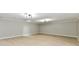 Finished basement features wood-look floors, recessed lighting, and plenty of room at 1053 Millwood Ct # 3, Indianapolis, IN 46260
