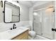 Beautifully renovated bathroom featuring modern fixtures, vanity, and a glass-enclosed shower at 1053 Millwood Ct # 3, Indianapolis, IN 46260