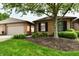 Charming brick home with mature landscaping and attached two-car garage at 1053 Millwood Ct # 3, Indianapolis, IN 46260
