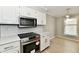Kitchen featuring new stainless steel appliances, and white cabinets at 1053 Millwood Ct # 3, Indianapolis, IN 46260