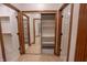 Well-organized closet with mirrored doors and ample shelving, providing easy storage and access at 1188 Old Eagle Way, Greenwood, IN 46143