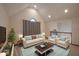 Cozy living room with vaulted ceilings and comfortable seating, creating a warm and inviting atmosphere at 1188 Old Eagle Way, Greenwood, IN 46143