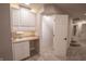 Functional wet bar featuring built-in cabinets and sink, ideal for entertaining and adding convenience at 1188 Old Eagle Way, Greenwood, IN 46143