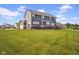 Expansive backyard featuring a well-maintained lawn, ideal for recreation and outdoor activities at 1313 Brentford Ln, Greenwood, IN 46143