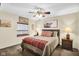 Inviting bedroom with ceiling fan, natural light, and comfortable furnishings at 1313 Brentford Ln, Greenwood, IN 46143